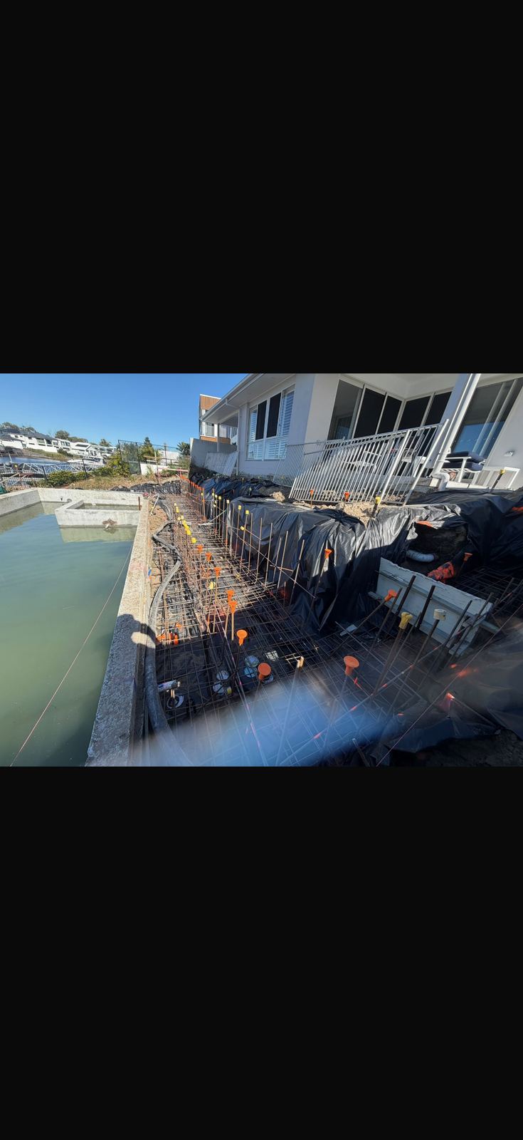 Pool surround footing with reinforcement steel