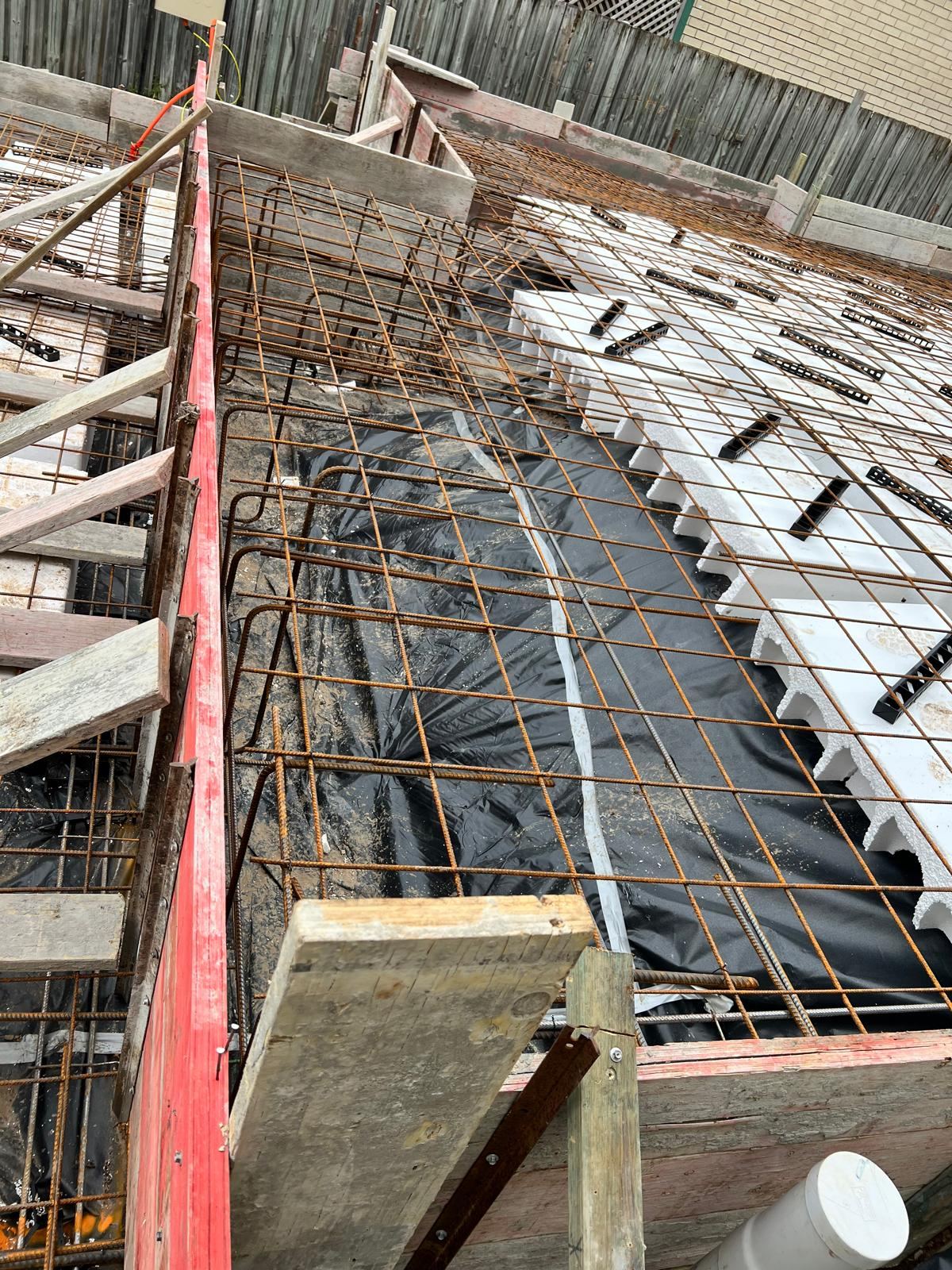 Reinforcement and void former detail before a slab pour