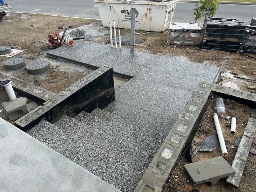 Aerial view of stair formwork and stormwater pit under construction