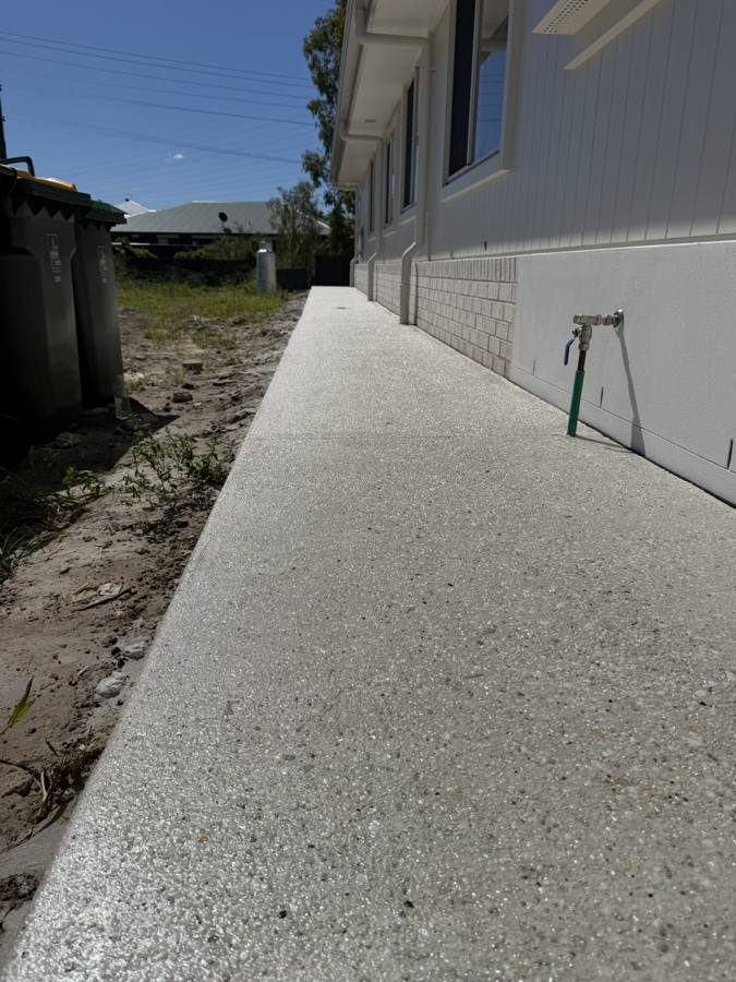 Close-up of exposed aggregate concrete path finish
